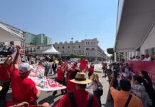 Trabajadores del Monte de Piedad desfilan este 1 de mayo; cumplen 7 meses de huelga